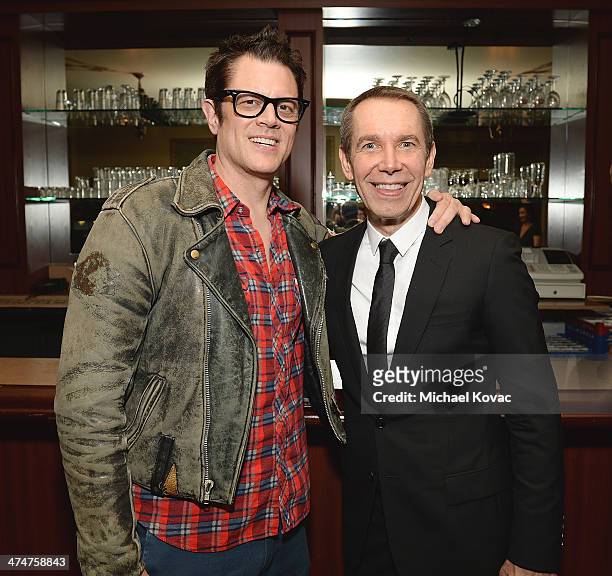 Actor Johnny Knoxville and artist Jeff Koons attend the Dom Perignon Reception after The Un-Private Collection: Jeff Koons and John Waters in...