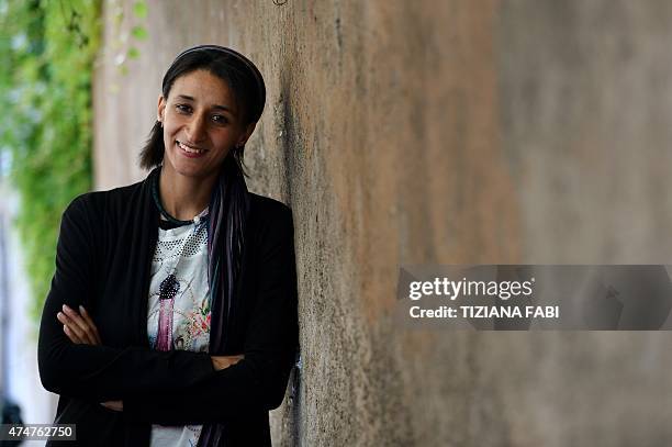 Human rights activist Nawal Soufi poses during a press conference for the release of the book "Nawal, L'Angelo dei Profughi" by Italian journalist...