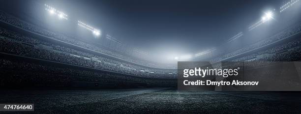 dramatic soccer stadium panorama - football stadium stock pictures, royalty-free photos & images