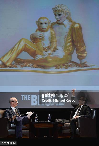 Director John Waters and artist Jeff Koons converse onstage at The Un-Private Collection: Jeff Koons and John Waters in Conversation at Orpheum...