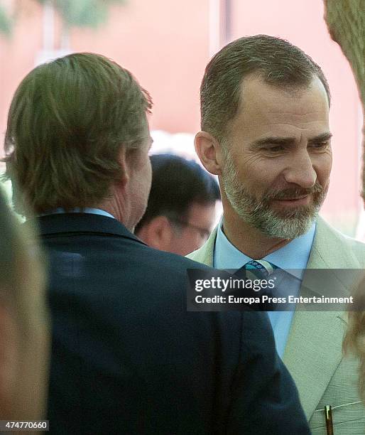 King Felipe VI of Spain and Beltran Gomez-Acebo attend the First Communion of Luis and Laura Gomez-Acebo on May 23, 2015 in Madrid, Spain.