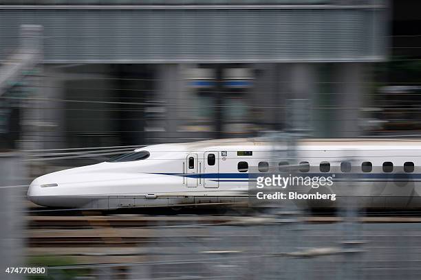 Central Japan Railway Co. N700 series Shinkansen bullet train approaches Tokyo Station in Tokyo, Japan, on Sunday, May 24, 2015. Japan was first in...
