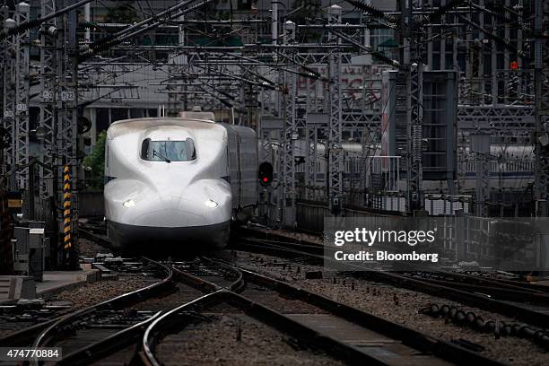 Central Japan Railway Co. N700 series Shinkansen bullet train approaches Tokyo Station in Tokyo, Japan, on Sunday, May 24, 2015. Japan was first in...