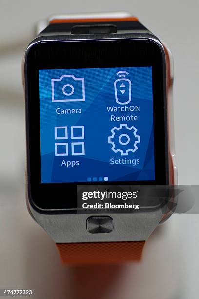 Galaxy Gear 2 wearable device sits on display during a Samsung Electronics Co. News conference on the opening day of the Mobile World Congress in...