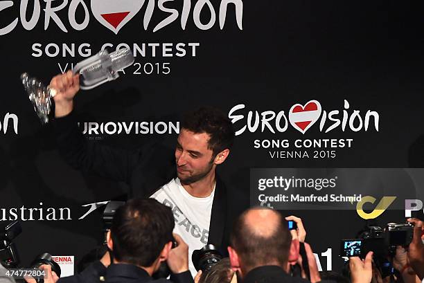 Mans Zelmerlow of Sweden holds the throphy during the press conference after winning the Eurovision Song Contest final on May 23, 2015 in Vienna,...