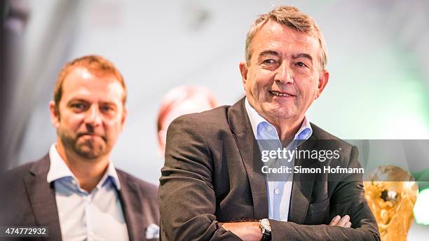 President Wolfgang Niersbach and Hansi Flick smile during the DFB Ehrenrunde Kick-Off event on May 26, 2015 in Frankfurt am Main, Germany.