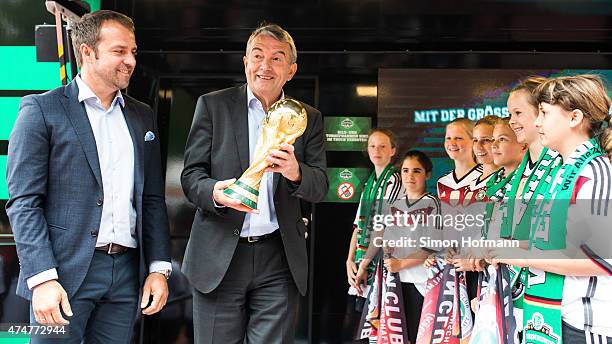 President Wolfgang Niersbach and Hansi Flick smile during the DFB Ehrenrunde Kick-Off event on May 26, 2015 in Frankfurt am Main, Germany.