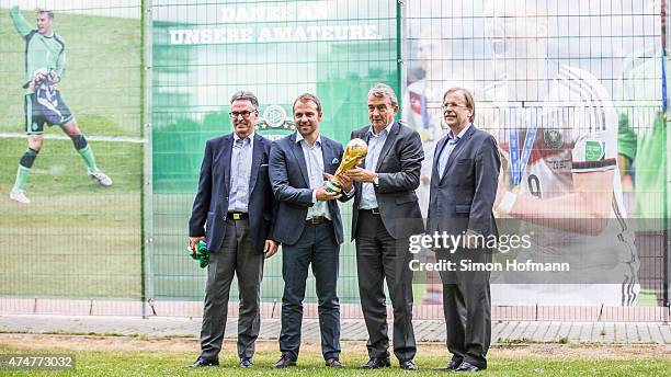 General Secretary Helmut Sandrock, Hansi Flick, DFB President Wolfgang Niersbach and Rainer Koch pose prior to the DFB Ehrenrunde Kick-Off event on...