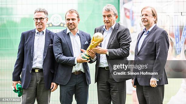 General Secretary Helmut Sandrock, Hansi Flick, DFB President Wolfgang Niersbach and Rainer Koch pose prior to the DFB Ehrenrunde Kick-Off event on...
