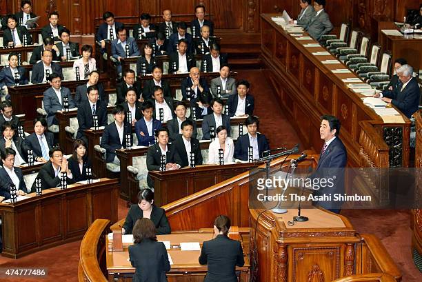 Japanese Prime Minister Shinzo Abe addresses on the controversial national security legislation bill during the lower house plenary session of the...