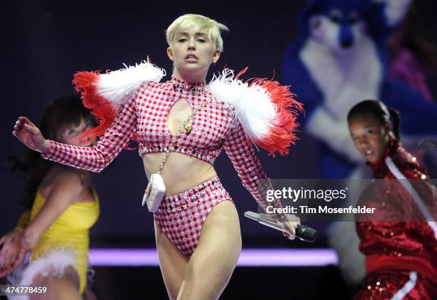 Miley Cyrus performs part of her Bangerz Tour at ORACLE Arena on February 24, 2014 in Oakland, California.
