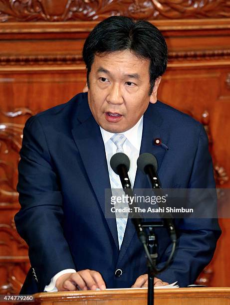 Opposition Democratic Party of Japan secretary general Yukio Edano questions on the controversial national security legislation bill during the lower...