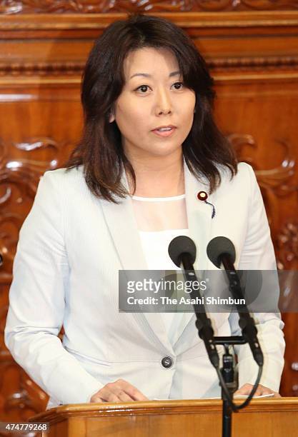 Japan Innovation Party lawmaker Kazumi Ota questions on the controversial national security legislation bill during the lower house plenary session...