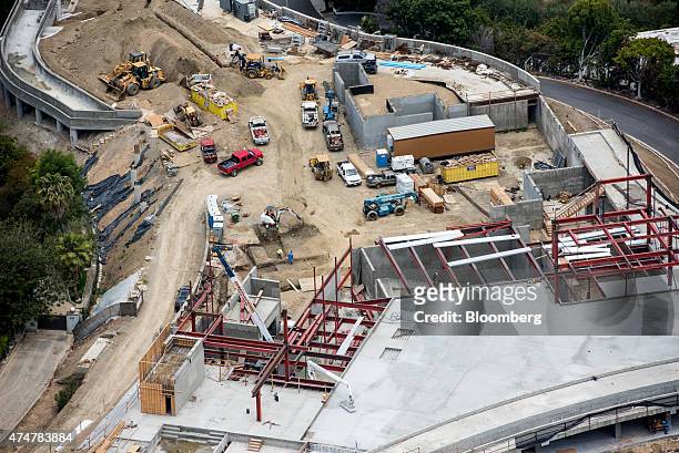 Construction continues at a home being built by Nile Niami, a film producer and speculative residential developer, in this aerial photograph taken in...