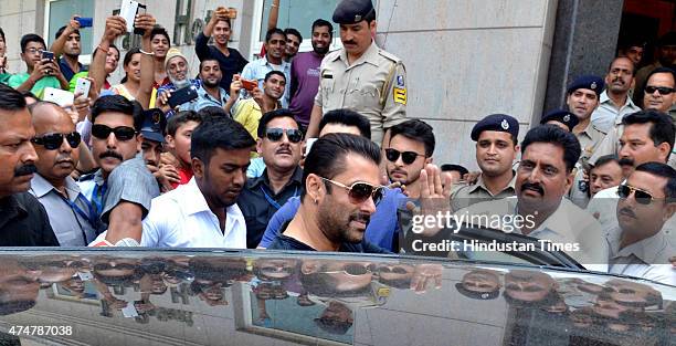 Bollywood actor Salman Khan accepting fans wishes when he was leaving farm house of Sukh Ram at Surth on May 26, 2015 in Mandi, India. Salman and his...