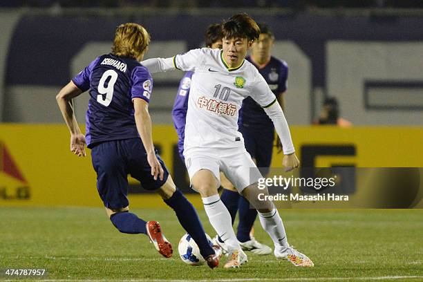 Zhang Xizhe of Beijing Guoan in action during the AFC Champions League match between Sanfrecce Hiroshima and Beijing Guoan at Hiroshima Big Arch on...