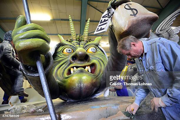 The Carnival parade float satirizing the FIFA under the slogan 'The whole truth' pictured on February 25, 2014 in Mainz, Germany. The subject will...
