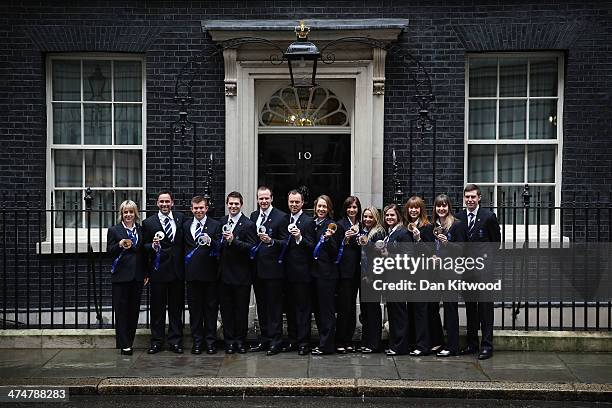 Great Britains Winter Olympic Medalists pose with their medals at 10 Downing Street on February 25, 2014 in London, England. The Winter Olympic medal...
