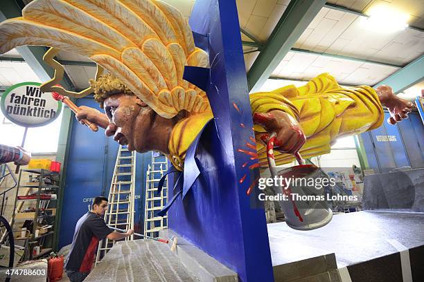 The Carnival parade float satirizing scandal about the automobile association ADAC under the motto 'angel-crash' pictured on February 25, 2014 in...