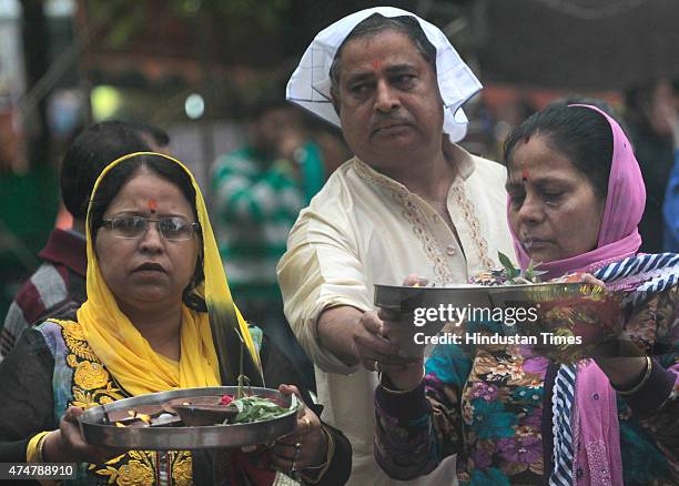 Kashmiri Hindu devotees offer prayers during the annual Hindu festival at the Kheer Bhawani Temple at Tulla Mulla Ganderbal on May 26, 2015 some 28...