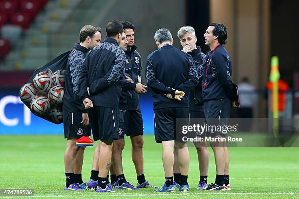 Unai Emery, coach of Sevilla talks to staff during an FC Sevilla training session on the eve of the UEFA Europa League Final against FC Dnipro...