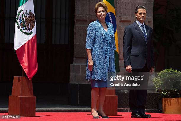 President of Brazil Dilma Rousseff and President of Mexico Enrique Pena Nieto are seen during the official welcome ceremony at National Palace in...