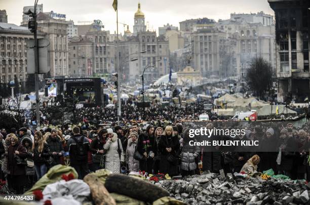 People visit and mourn on Kiev's Independence Square on February 25, 2014. Ukraine's interim leader on February 25 delayed the appointment of a new...