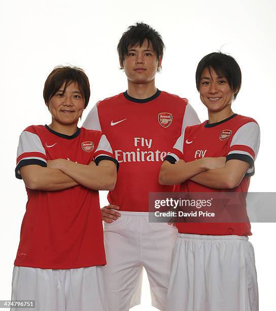 Arsenal Ladies new signings Yukari Kinga and Shinobu Ohno with Ryo Miyaichi at Arsenal Training Ground at London Colney on February 25, 2014 in St...