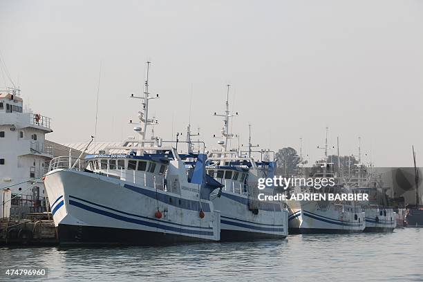 Six French-built fishing vessels dock at the Maputo Harbour, on May 26, 2015 in Maputo, part of the latest batch of fishing vessels built at...