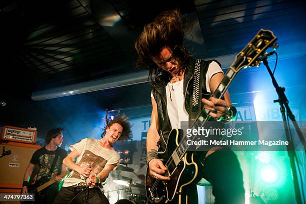 Rob Ellershaw, Aaron Buchanan and Sid Glover of British hard rock group Heaven's Basement performing live aboard the boat HMS Hammer en route to the...