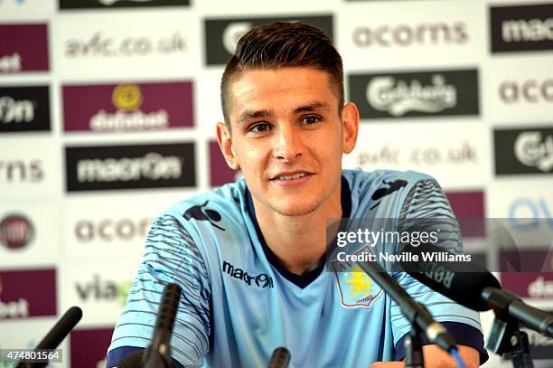 Ashley Westwood of Aston Villa speaks to the press during the Aston Villa FA Cup Final media day at Bodymoor Heath training ground on May 26, 2015 in...