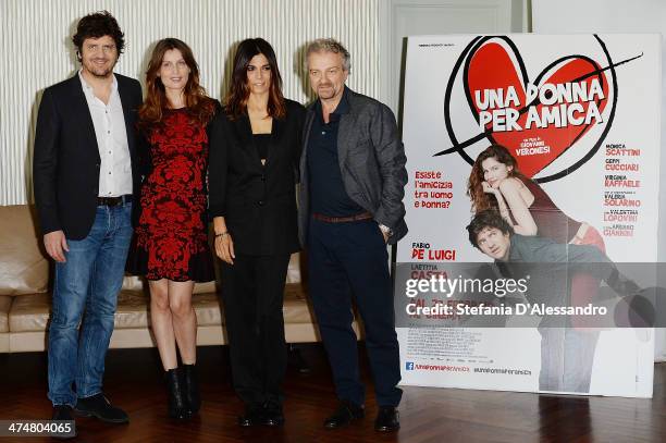 Fabio De Luigi, Laetitia Casta, Valeria Solarino and Giovanni Veronesi attend 'Una Donna Per Amica' Photocall on February 25, 2014 in Milan, Italy.