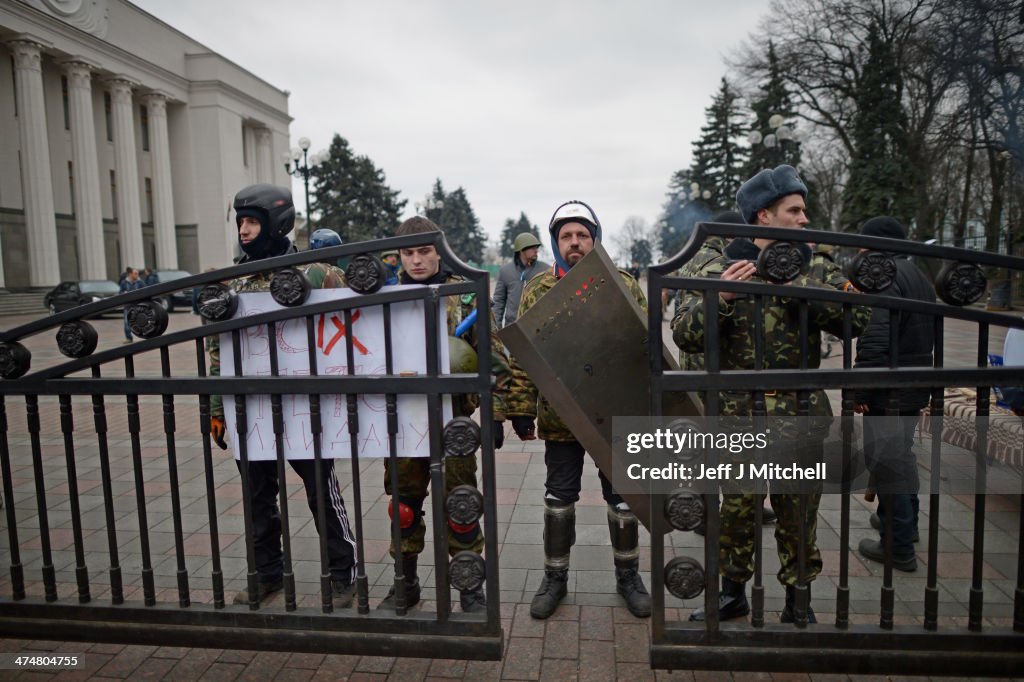 Arrest Warrant Issued For Former Ukrainian Leader As Square Becomes Shrine To Dead