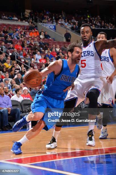 Jose Calderon of the Dallas Mavericks drives to the basket against Arnett Moultrie of the Philadelphia 76ers at the Wells Fargo Center on February...