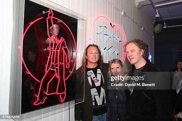 Christian Furr, Linda and Marcus Bracey attend the Lights of Soho private view on May 26, 2015 in London, England.