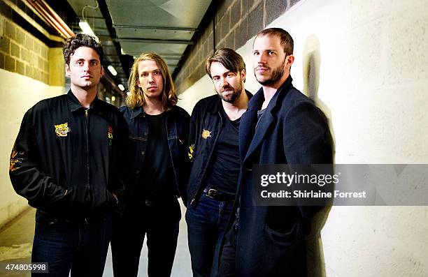 Justin Young, Freddie Cowan, Pete Robertson and Arni Hjorvar of The Vaccines pose backstage before meeting fans and signing copies of their new album...
