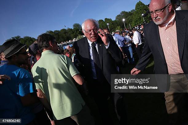 Sen. Bernie Sanders greets supporters after officially announcing his candidacy for the U.S. Presidency during an event at Waterfront Park May 26,...