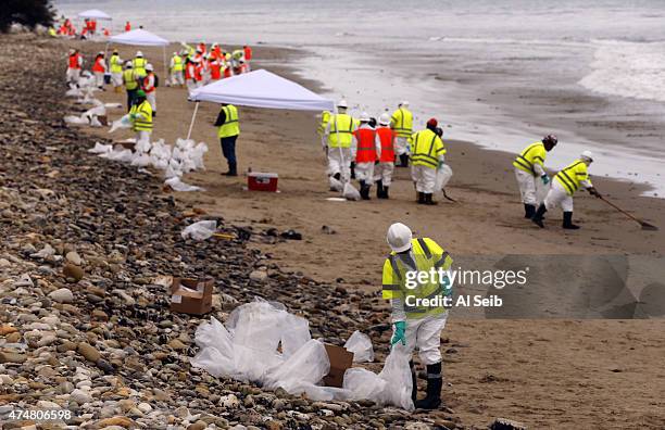 Crews in protective gear continue cleanup work at Refugio State Beach May 26, 2015 on the Gaviota Coast west of Goleta, California. Santa Barbara...