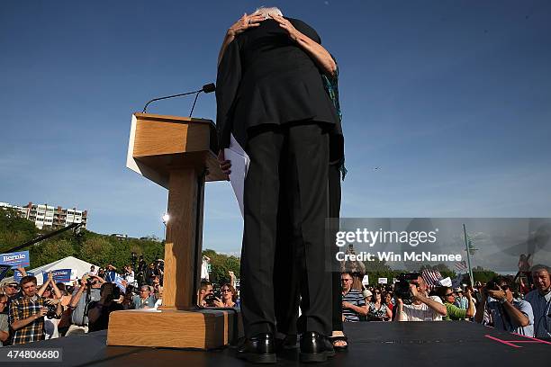 Sen. Bernie Sanders is hugged by his wife, Jane O'Meara Sanders, after officially announcing his candidacy for the U.S. Presidency during an event at...