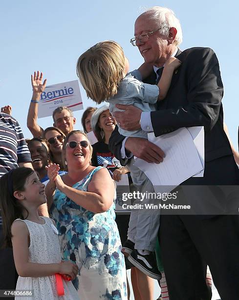 Sen. Bernie Sanders celebrates with members of his family after officially announcing his candidacy for the U.S. Presidency during an event at...