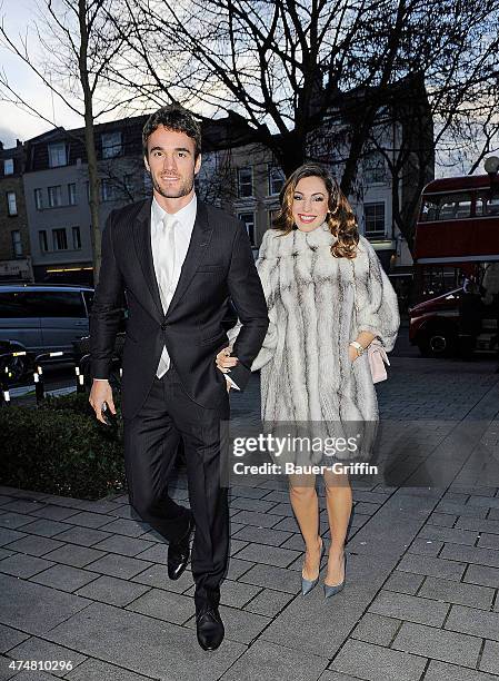 Kelly Brook with Thom Evans are seen attending her manager Severine Berman's wedding on December 15, 2012 in London, United Kingdom.