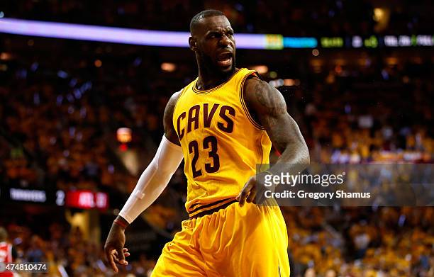 LeBron James of the Cleveland Cavaliers reacts after a play in the first quarter against the Atlanta Hawks during Game Four of the Eastern Conference...