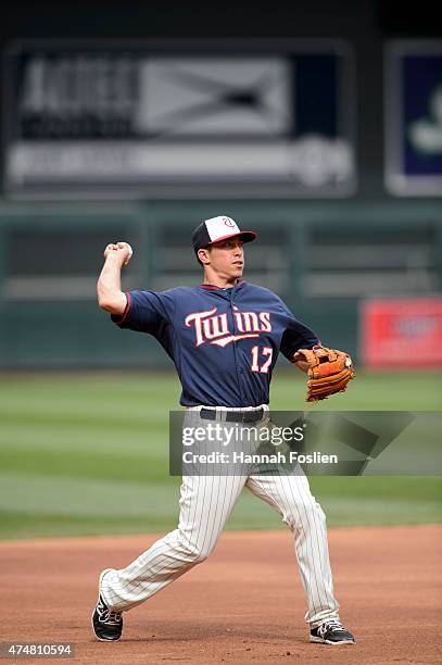 Doug Bernier of the Minnesota Twins warms up at shortstop during batting practice before the game against the Oakland Athletics on May 6, 2015 at...