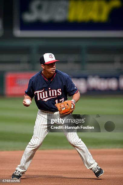 Doug Bernier of the Minnesota Twins warms up at shortstop during batting practice before the game against the Oakland Athletics on May 6, 2015 at...