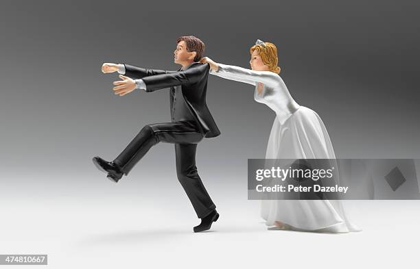 wedding figurines domination - figurine people stock pictures, royalty-free photos & images