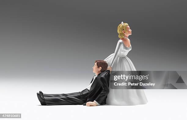 wedding figurines relationship difficulties - drunk husband stock pictures, royalty-free photos & images