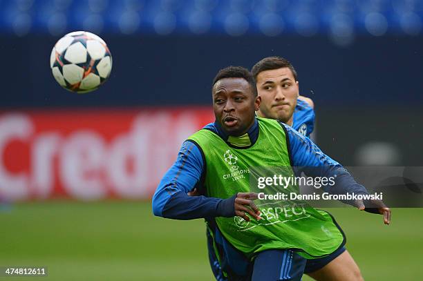 Chinedu Obasi of FC Schalke 04 is chased by Sead Kolasinac during a training session ahead of the Champions League match between FC Schalke 04 and...