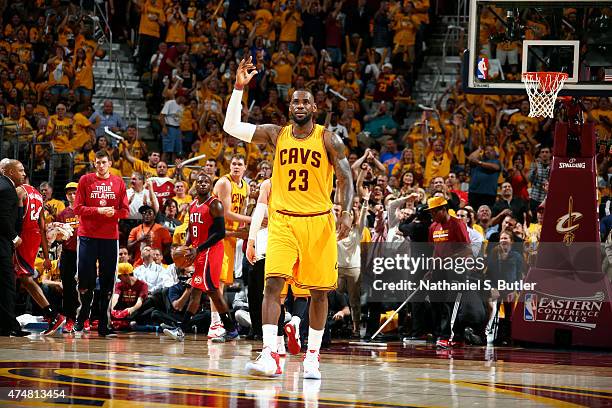 LeBron James of the Cleveland Cavaliers celebrates during a game against the Atlanta Hawks in Game Four of the Eastern Conference Finals during the...