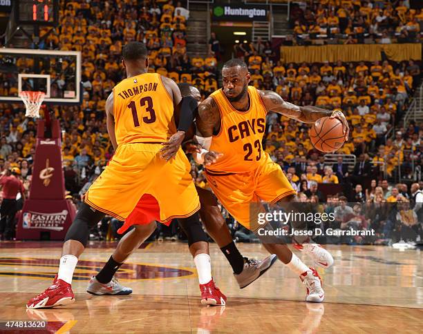 LeBron James of the Cleveland Cavaliers cuts to the basket against the Atlanta Hawks at the Quicken Loans Arena During Game Four of the Eastern...