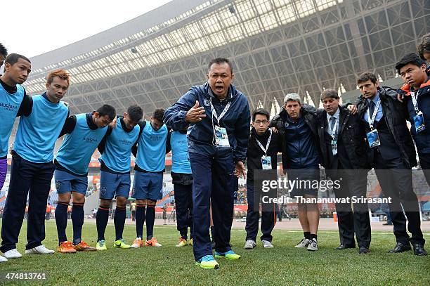 Buriram United club president, Newin Chidchob speaks to the team during the Asian Champions League match between Shandong Luneng FC and Buriram...